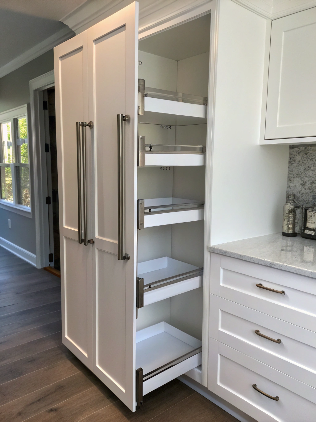 Fairview butler pantry cabinetry in rift-cut oak with black marble